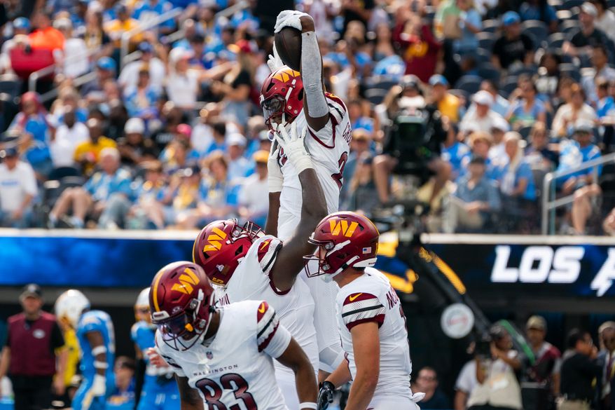 Washington Commanders Running Back Jacory Crosket-Merritt (22) celebrates his first touchdown of the game at SoFi Stadium in Inglewood California. The Washington Commanders defeated the Los Angeles Chargers 27-10 during NFL Week 5 on October 5th, 2025. (Photo by Jordan Sabillo for Washington Times)