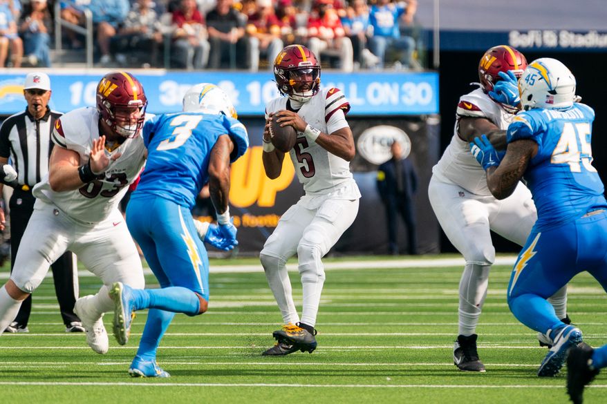 Washington Commanders Quarterback Jayden Daniels (5) drops back for a pass at SoFi Stadium in Inglewood California. The Washington Commanders defeated the Los Angeles Chargers 27-10 during NFL Week 5 on October 5th, 2025. (Photo by Jordan Sabillo for Washington Times)
