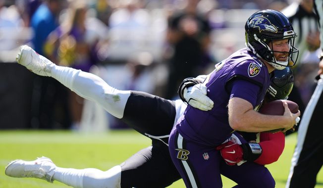during the first half of an NFL football game, Sunday, Oct. 5, 2025, in Baltimore. (AP Photo/Stephanie Scarbrough)