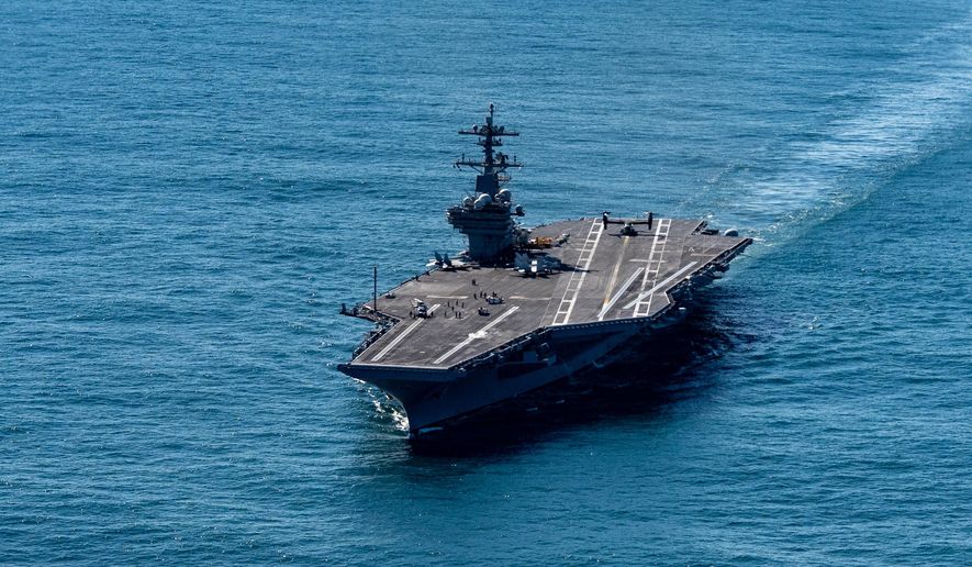 The USS George H.W. Bush aircraft carrier sails in the Atlantic Ocean off the coast of Norfolk, Va., Saturday, Oct. 4, 2025. (AP Photo/Alex Brandon, Pool) ** FILE **
