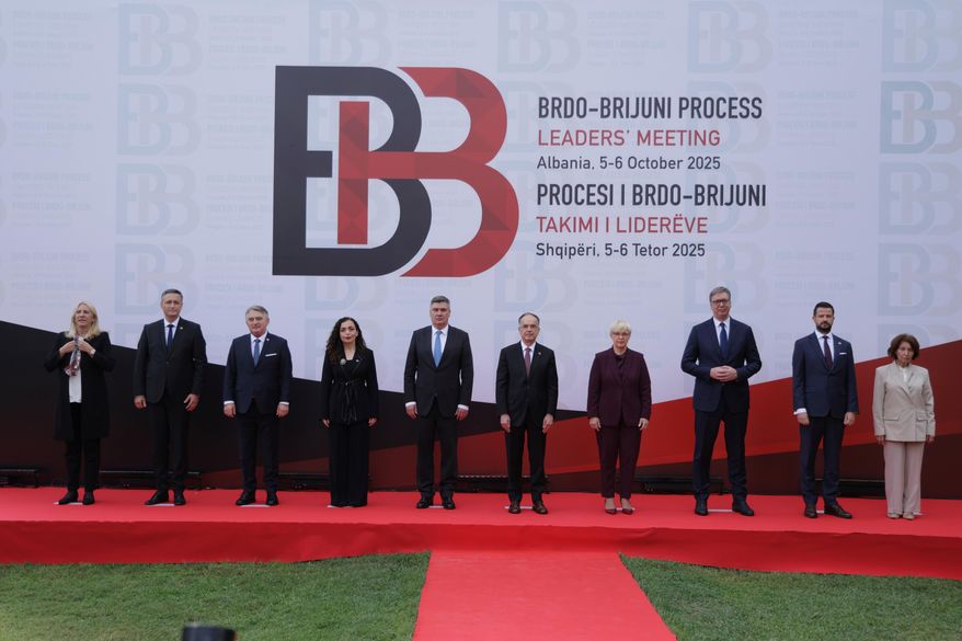 From left to right Presidents of Bosnia and Herzegovina Zeljka Cvijanovic , Denis Becirovic, Zeljko Komsic , Kosovo's President Vjosa Osmani , Croatian President Zoran Milanovic , President of Albania Bajram Begaj, Natasa Pirc Musar, President of Slovenia and Serbian President Aleksandar Vucic, Montenegro President Jakov Milatovic and North Macedonia President Gordana Siljanovska-Davkova pose for a photo during the Brdo-Brijuni, Process Leaders' Meeting in Golem, Albania, 50 kilometers (30 miles) west of the capital, Tirana , Albania on Monday, Oct. 6, 2025 .(AP Photo/Vlasov Sulaj)