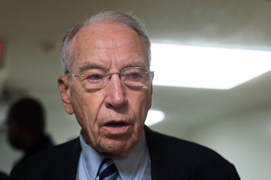 Sen. Sen. Chuck Grassley, R-Iowa, speaks to reporters at the Capitol, Wednesday, Oct. 1, 2025, in Washington. (AP Photo/Manuel Balce Ceneta)
