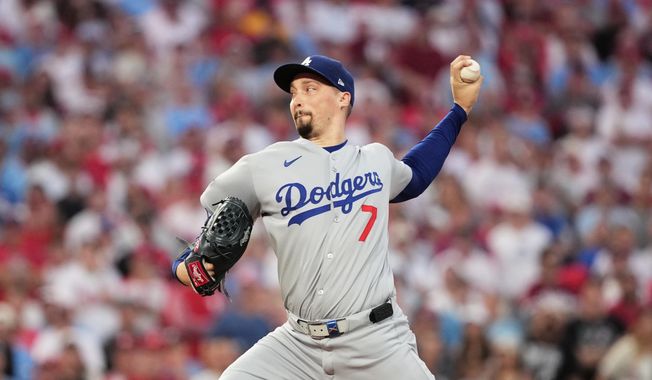 Los Angeles Dodgers starting pitcher Blake Snell throws during the first inning in Game 2 of baseball's National League Division Series against the Philadelphia Phillies, Monday, Oct. 6, 2025, in Philadelphia. (AP Photo/Matt Slocum)