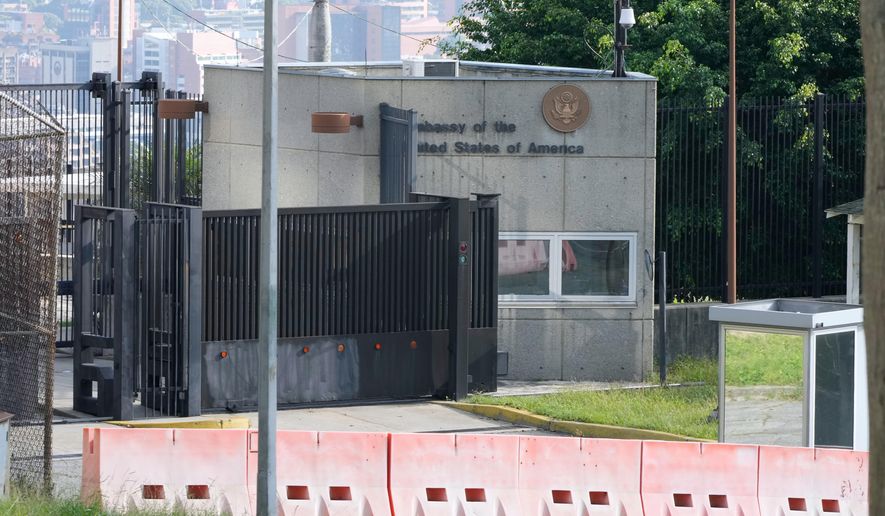The entrance to the U.S. embassy in Caracas, Venezuela, Monday, Oct. 6, 2025. (AP Photo/Ariana Cubillos)