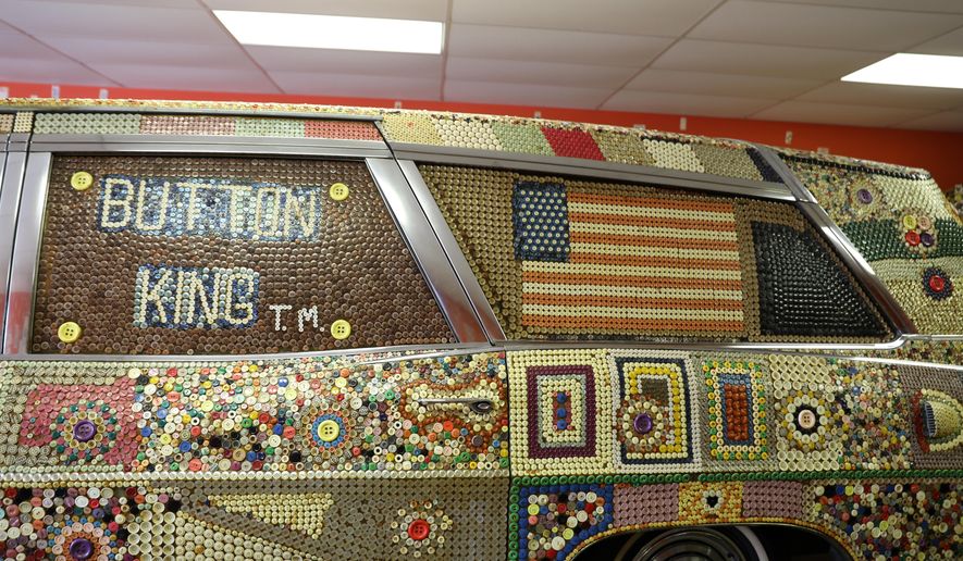 Dalton Stevens' button hearse is displayed in his museum in Bishopville, S.C., on Tuesday, Sept. 9, 2025. (AP Photo/Jeffrey Collins)