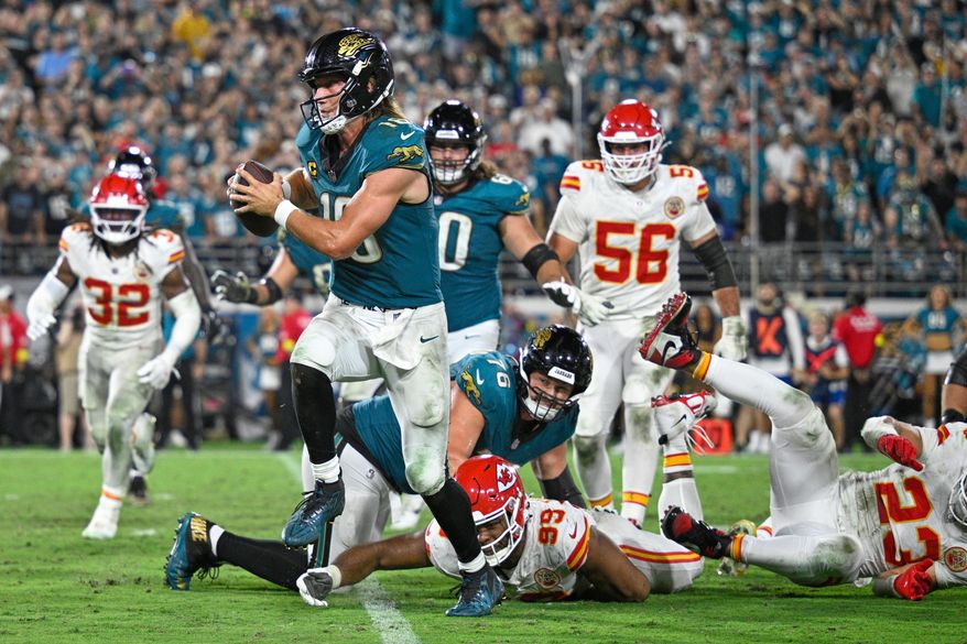 Jacksonville Jaguars quarterback Trevor Lawrence (16) runs for a touchdown during the second half of an NFL football game against the Kansas City Chiefs, Monday, Oct. 6, 2025, in Jacksonville, Fla. (AP Photo/Phelan M. Ebenhack)
