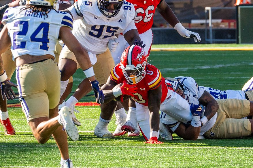 Maryland running back Dejuan Williams (0) runs against Washington during the first half of an NCAA college football game, Saturday, Oct. 4, 2025, in College Park, Md. (Andrew Banez/All-Pro Reels)