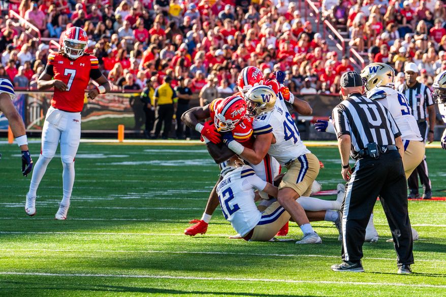 Maryland running back Dejuan Williams (0) runs against Washington during an NCAA college football game, Saturday, Oct. 4, 2025, in College Park, Md. (Andrew Banez/All-Pro Reels)