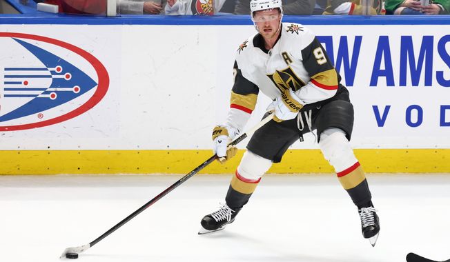 FILE - Vegas Golden Knights center Jack Eichel (9) skates with the puck during the third period of an NHL hockey game against the Buffalo Sabres Saturday, March 15, 2025, in Buffalo, N.Y. (AP Photo/Jeffrey T. Barnes, File)