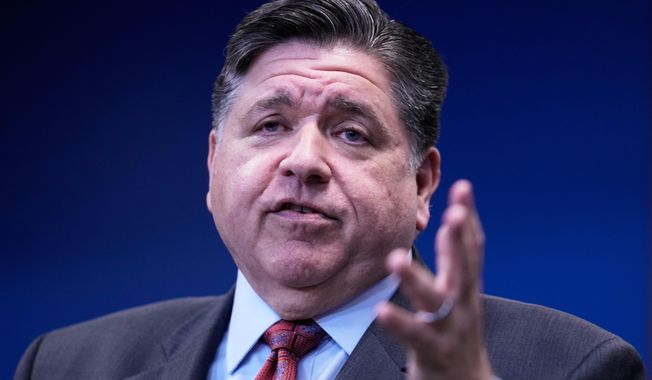 Governor JB Pritzker talks to media at a news conference in Chicago, Monday, Oct. 6, 2025. (AP Photo/Nam Y. Huh)