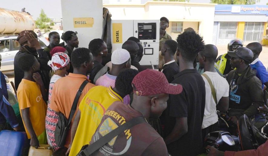 People queue at a gas station amid a fuel shortage in Bamako Mali, Tuesday, Oct 7, 2025 (AP Photo)