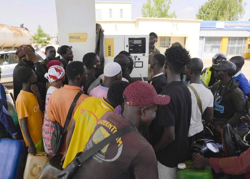 People queue at a gas station amid a fuel shortage in Bamako Mali, Tuesday, Oct 7, 2025 (AP Photo)