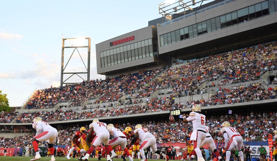 FILE - Birmingham Stallions quarterback J'Mar Smith, front right, collects the snap during the first half of a USFL football game against the Philadelphia Stars for the league championship, Sunday, July. 3, 2022, in Canton, Ohio. (AP Photo/David Dermer, File)