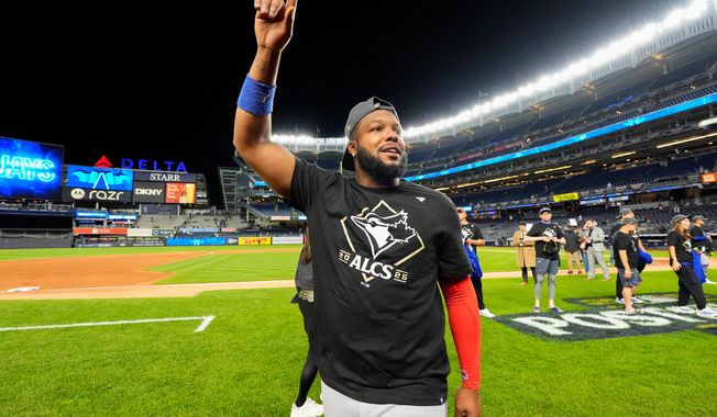 Toronto Blue Jays first baseman Vladimir Guerrero Jr. celebrates after the Blue Jays beat the New York Yankees in Game 4 of baseball's American League Division Series, Wednesday, Oct. 8, 2025, in New York. (AP Photo/Yuki Iwamura)