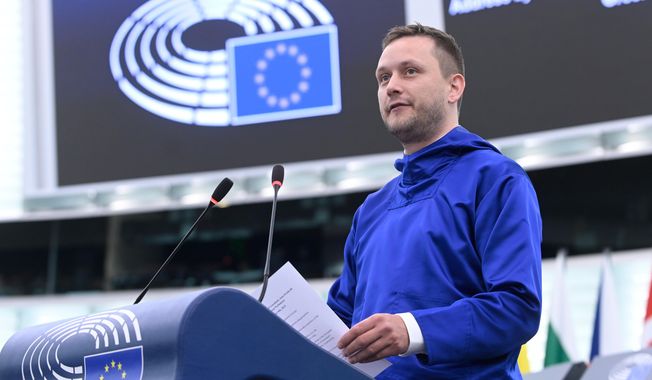 Prime Minister of Greenland Jens-Frederik Nielsen delivers a speech Wednesday, Oct. 8, 2025 at the European Parliament in Strasbourg, eastern France. (AP Photo/Pascal Bastien)