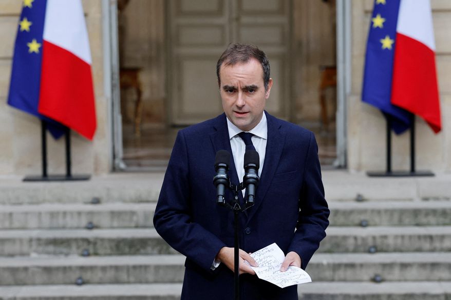 French outgoing Prime Minister Sebastien Lecornu makes a statement at the Hotel Matignon, the Prime Minister's residence, Wednesday, Oct. 8, 2025. (Stephanie Lecocq, Pool via AP)