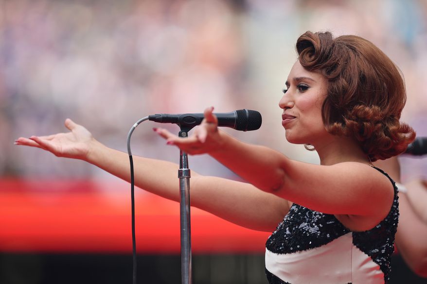 Singer, Raye performs at half-time during the NFL game between Minnesota Vikings and Cleveland Browns at the Tottenham Hotspur stadium in London, Sunday, Oct. 5, 2025. (AP Photo/Ian Walton)