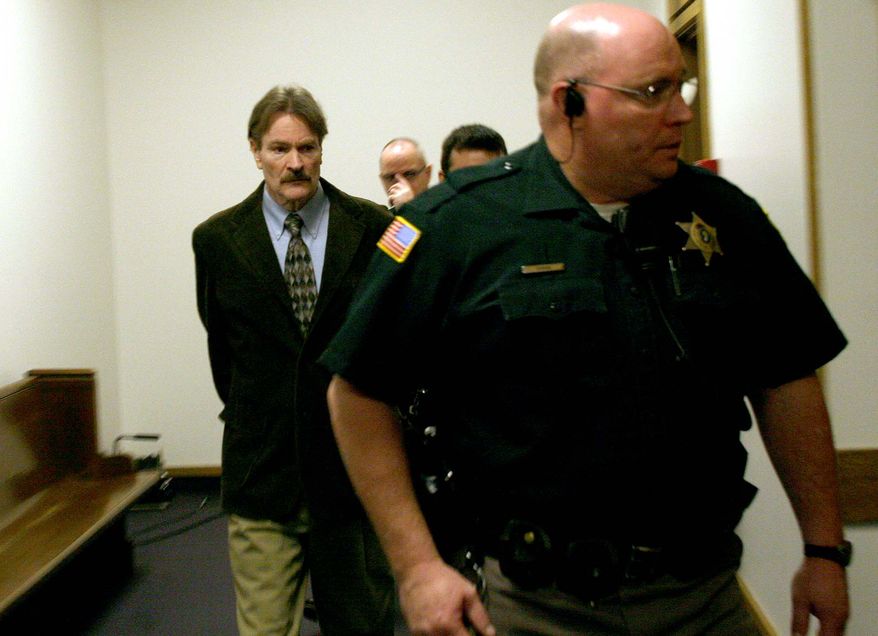 Spokane's South Hill Rapist Kevin Coe is led into a courtroom at the Spokane County Courthouse in Spokane, Wash., Monday, Dec. 18, 2006, to begin a civil commitment hearing. Coe is likely to commit further sexual violence if he is not kept off the streets, the state argued Monday at a hearing that could lead to Coe being permanently confined. (AP Photo/Amanda Smith) **FILE**