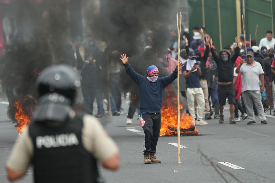Demonstrators protest the elimination of the diesel subsidy by President Daniel Noboa's government, in Calderon, Ecuador, Thursday, Oct. 9, 2025. (AP Photo/Dolores Ochoa)