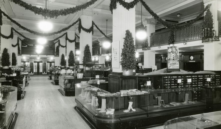This 1940s photo provided by the Detroit Historical Society shows the J.L. Hudson Company Department Store retail floor decorated for the holidays in Detroit. (Davis B. Hillmer via AP)