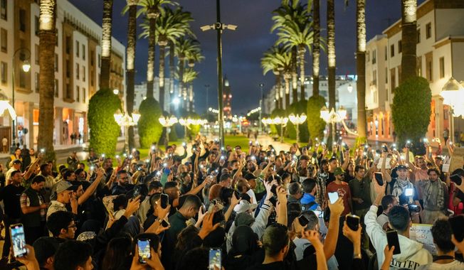 People take part in a youth-led protest against corruption and calling for education and healthcare reforms, in Rabat, Morocco, Thursday, Oct. 9, 2025. (AP Photo/Mosa'ab Elshamy)