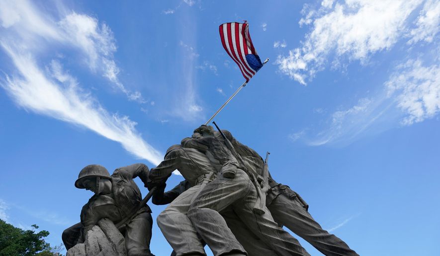 An Iwo Jima Memorial tribute statue is pictured near the entrance of Marine Base Quantico, Friday Sep. 26, 2025, in Quantico, Va. (AP Photo/Steve Helber)