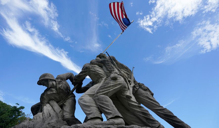 An Iwo Jima Memorial tribute statue is pictured near the entrance of Marine Base Quantico, Friday Sep. 26, 2025, in Quantico, Va. (AP Photo/Steve Helber)