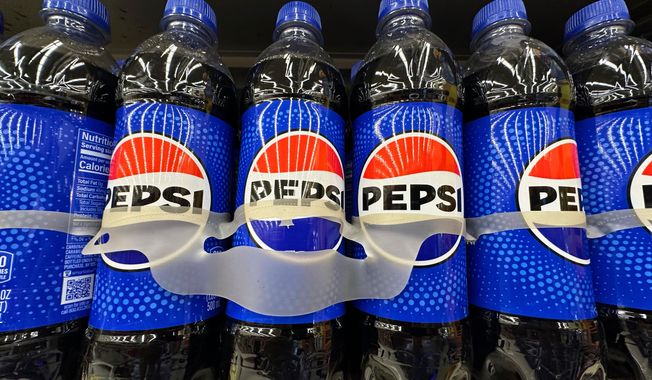 FILE - Bottles of Pepsi are displayed at a grocery store in Mount Prospect, Ill., Thursday, July 17, 2025. (AP Photo/Nam Y. Huh, File)