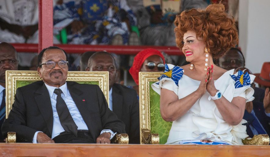 Cameroon's President Paul Biya and First Lady Chantal Biya attend a political rally at Lamido Yaya Dairou Stadium in Maroua, Cameroon, Tuesday, Oct. 7, 2025. (AP Photo/Welba Yamo Pascal)
