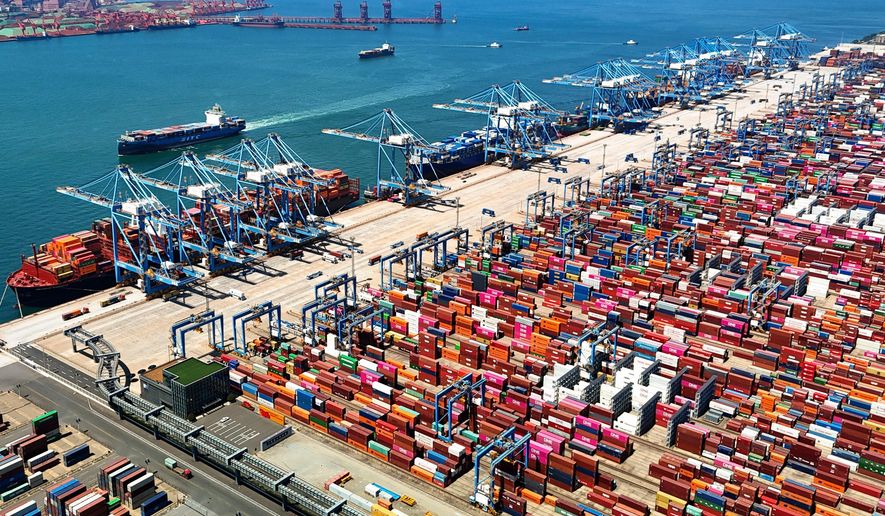 An aerial view of a container port is seen in Qingdao in east China's Shandong province, on June 6, 2024. (Chinatopix via AP, File)