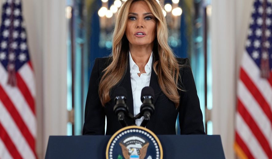First lady Melania Trump speaks in the Grand Foyer of the White House, Friday, Oct. 10, 2025, in Washington. (AP Photo/Alex Brandon)