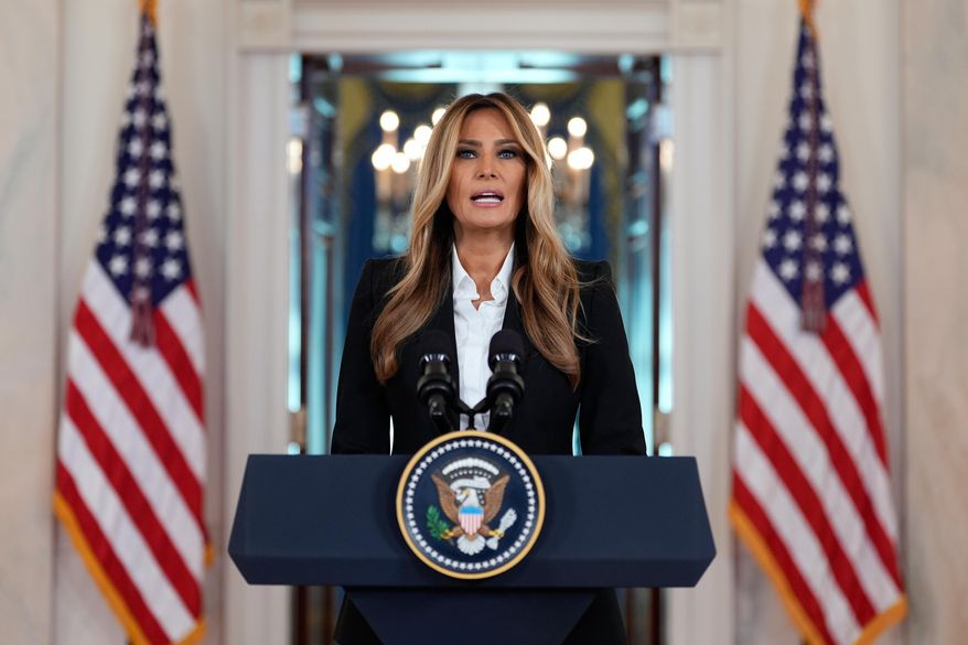 First lady Melania Trump speaks in the Grand Foyer of the White House, Friday, Oct. 10, 2025, in Washington. (AP Photo/Alex Brandon)