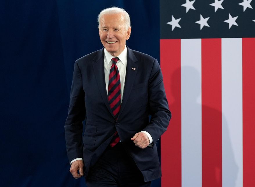 Then-President Joe Biden walks out to speak at the International African American Museum in Charleston, S.C., Sunday, Jan. 19, 2025. (AP Photo/Stephanie Scarbrough, File)