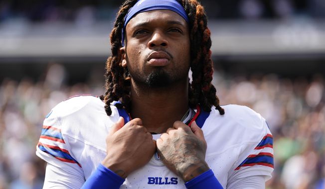 Buffalo Bills safety Damar Hamlin (3) stands for the national anthem before playing against the New York Jets in an NFL football game, Sunday, Sept. 14, 2025, in East Rutherford, N.J. (AP Photo/Yuki Iwamura)