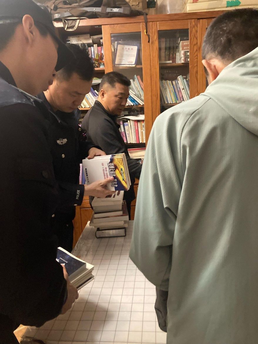 This photograph provided by pastor Sean Long of Zion Church shows police raiding the home of pastor Sun Cong of Zion Church in Beijing, China on Friday, Oct. 10, 2025. (Sean Long via AP)