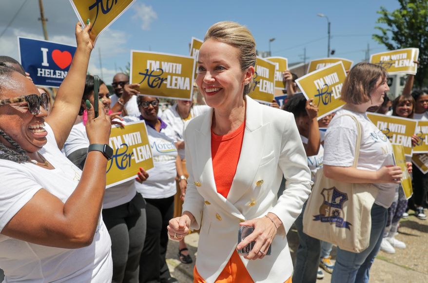 New Orleans City Councilmember Helena Moreno greets supporters as she arrives to submit her qualifying paperwork to run for mayor at the Orleans Parish Clerk of CourtÍs Office on Wednesday, July 9, 2025. (Brett Duke/The Times-Picayune/The New Orleans Advocate via AP)