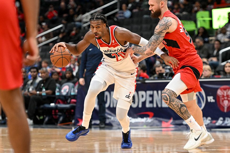 Washington Wizards center Alex Sarr (20) driving towards the basket during the first quarter of a preseason NBA game against the Toronto Raptors at Capital One Arena in Washington D.C., October 12, 2025. (Photo for the Washington Times)