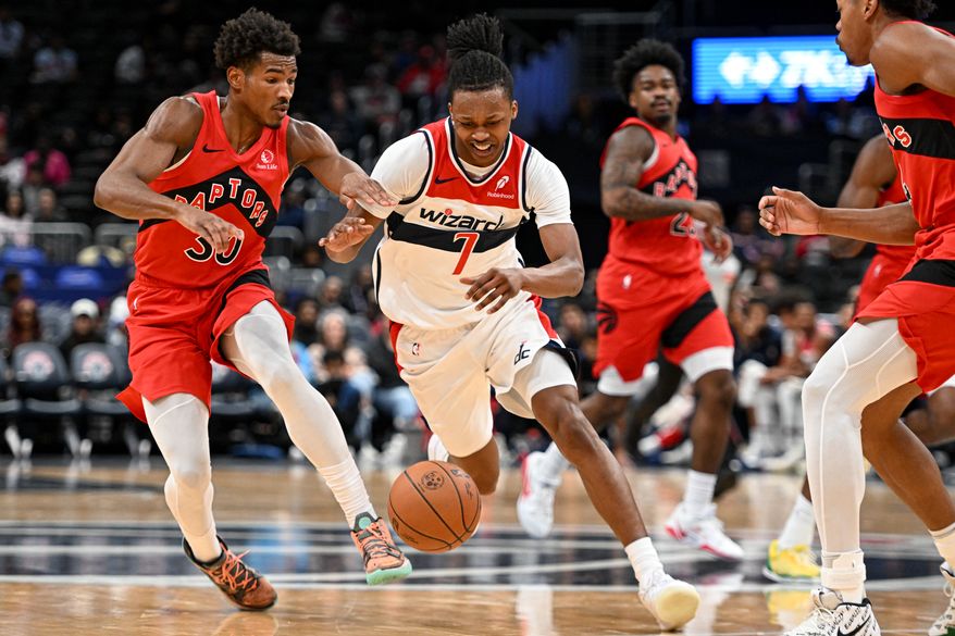 Washington Wizards guard Bub Carrington (7) dribbling the ball during the first quarter of a preseason NBA game against the Toronto Raptors at Capital One Arena in Washington D.C., October 12, 2025. (Photo for the Washington Times)
