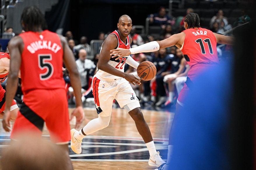 Washington Wizards forward Khris Middleton (22) bringing the ball up court during the second quarter of a preseason NBA game against the Toronto Raptors at Capital One Arena in Washington D.C., October 12, 2025. (Photo for the Washington Times)