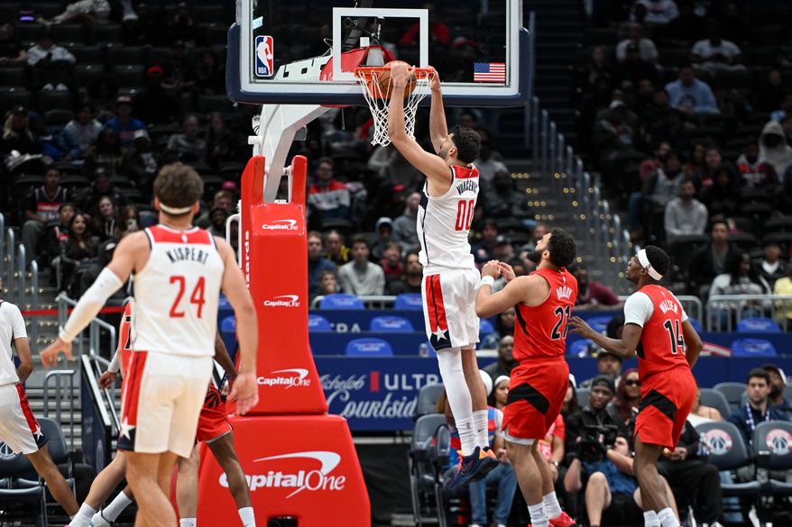 Washington Wizards forward Tristan Vukcevic (00) dunking the bll during the fourth quarter of a preseason NBA game against the Toronto Raptors at Capital One Arena in Washington D.C., October 12, 2025. (Photo for the Washington Times)