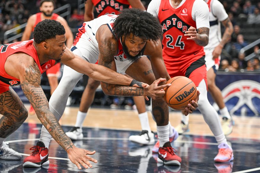 Washington Wizards center Marvin Bagley III (35) fightingn for the ball during the fourth quarter of a preseason NBA game against the Toronto Raptors at Capital One Arena in Washington D.C., October 12, 2025. (Photo for the Washington Times)