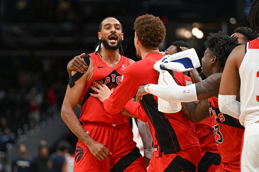 Toronto Raptors center Olivier Sarr (11) celebrating his game winning shot during the fourth quarter of a preseason NBA game against the Wasington Wizards at Capital One Arena in Washington D.C., October 12, 2025. (Photo for the Washington Times)