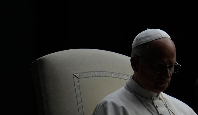 Pope Leo XIV presides over a Rosary vigil for peace in St. Peter's Square on the 63rd anniversary of the start of the Second Vatican Council, at the Vatican, Saturday, Oct. 12, 2025. (AP Photo/Gregorio Borgia)