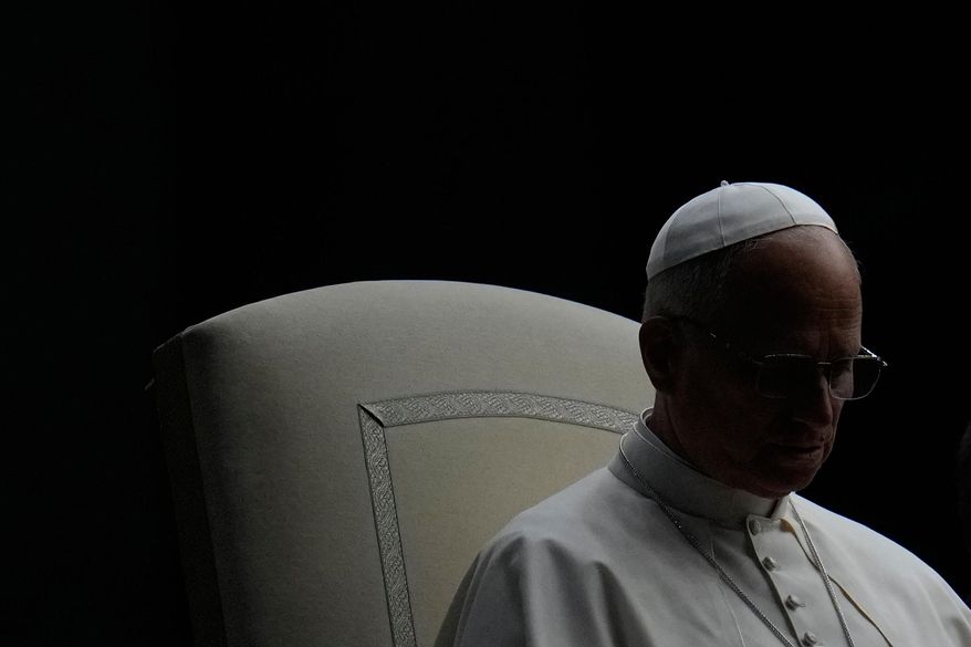 Pope Leo XIV presides over a Rosary vigil for peace in St. Peter's Square on the 63rd anniversary of the start of the Second Vatican Council, at the Vatican, Saturday, Oct. 12, 2025. (AP Photo/Gregorio Borgia)