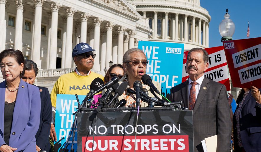 FILE - Del. Eleanor Holmes Norton, D-D.C., center, is joined by Rep. Judy Chu, D-Calif., far left, and Rep. Jesus Garcia, D-Ill., right, at a new conference opposing President Trump's deployment of National Guard troops and federal law enforcement officers to combat crime on the streets of Chicago, Baltimore, and other American cities, at the Capitol in Washington, Sept. 3, 2025. (AP Photo/J. Scott Applewhite, File)