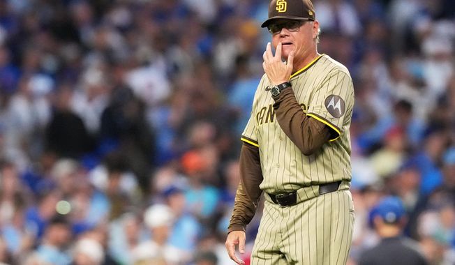 San Diego Padres manager Mike Shildt reacts during the seventh inning of Game 3 of a National League wild card baseball game against the Chicago Cubs Thursday, Oct. 2, 2025, in Chicago. (AP Photo/Nam Huh)