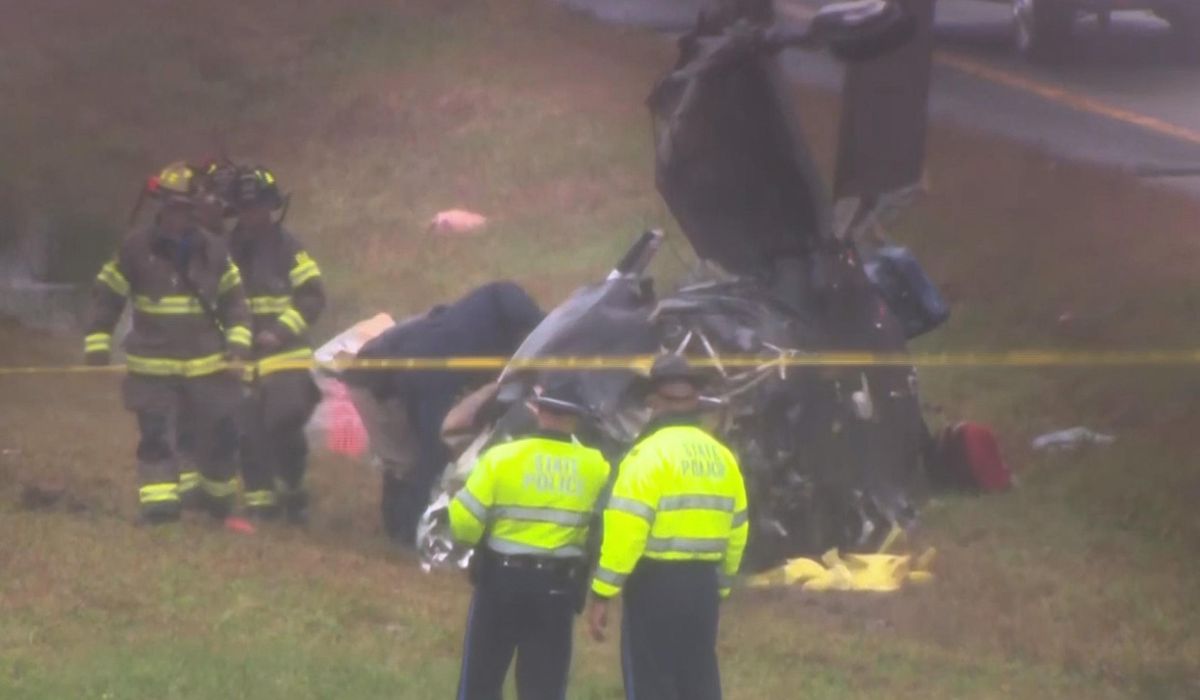 NextImg:Plane crashes onto a Massachusetts highway, killing 2 and wounding 1 on the ground