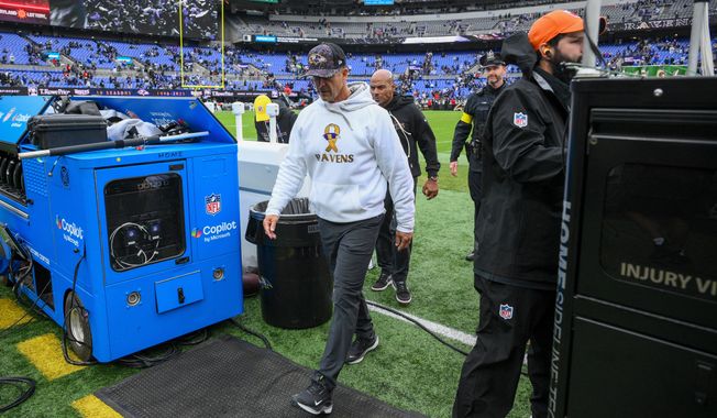 Baltimore Ravens head coach John Harbaugh leaves the field following an NFL football game against the Los Angeles Rams Sunday, Oct. 12, 2025, in Baltimore. (AP Photo/Nick Wass)