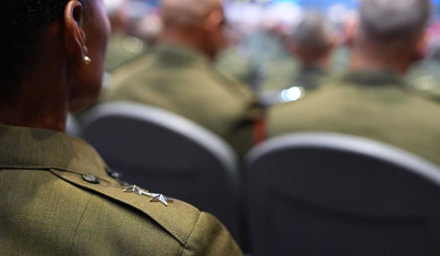 U.S. military senior leadership listen as President Donald Trump speaks at Marine Corps Base Quantico, Tuesday, Sept. 30, 2025 in Quantico, Va. (AP Photo/Evan Vucci)