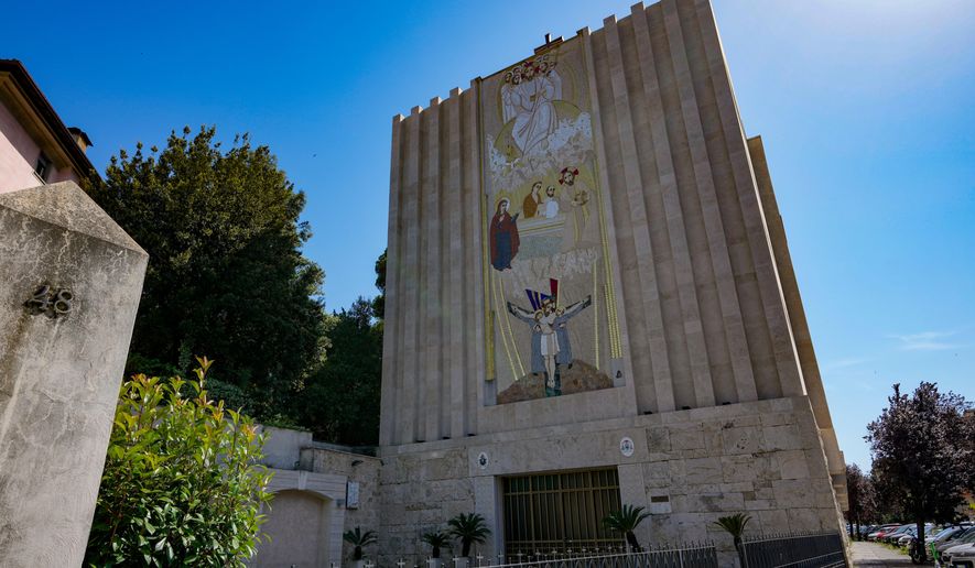 A mosaic by ex-Jesuit artist Marko Rupnik is seen on the main facade of the Church of Our Lady of the Canadian Martyrs, June 28, 2024, in Rome. (AP Photo/Andrew Medichini, File)